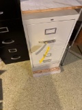 2 metal filing cabinets