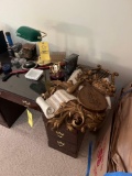 Miscellaneous contents on computer desk and small trash cans