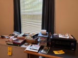 large assortment of office supplies, printer, rubber bands, calculator, misc