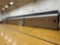 Entire one side of gymnasium retractable bleachers - remote - gym
