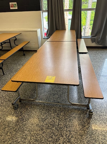 Folding cafeteria lunch table on casters