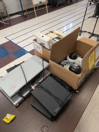 Assorted DVD players, phones, room 1202