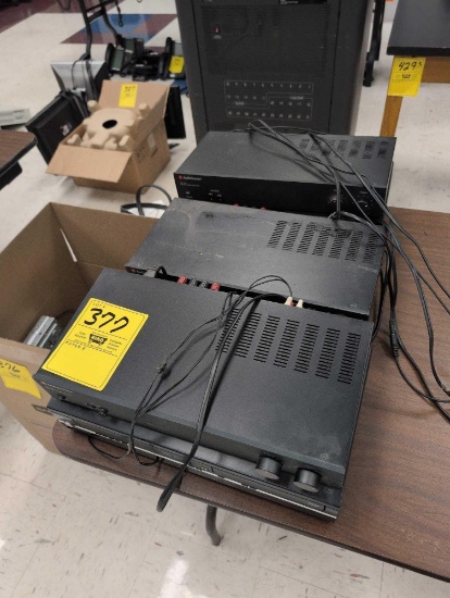 AudioSource amp 100 stereo amps and VHS/DVD players, room 1201