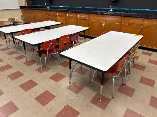 Three youth adjustable leg tables and chairs - Rm 1302