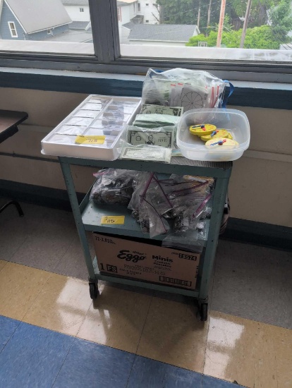 AV cart with child's play money, room 3401