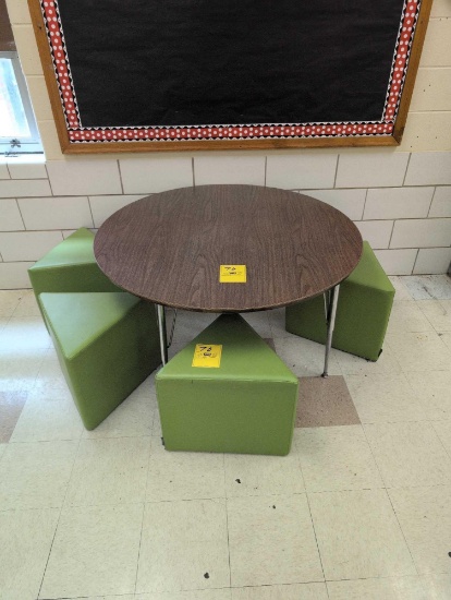 Round youth table with foam pad seats, room 1602