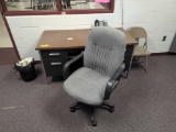 Metal teachers desk and chair, room 1202