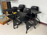4 adjustable desks on wheels - room 1201