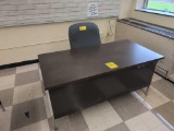 Metal teachers desk with office chair, room 1309