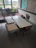 Activity table, desks and chairs, room 2106