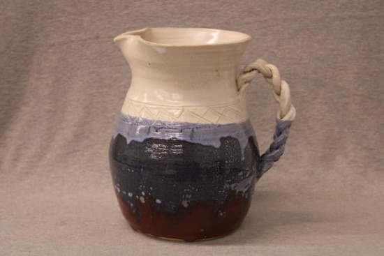 Distinctive handmade stoneware pitcher by Fred Beane