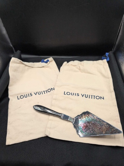 Louis Vuitton dust bags and silver plate cake server