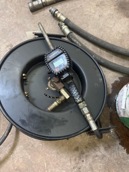 Retractable hose with Samson Oil dispensing nozzle