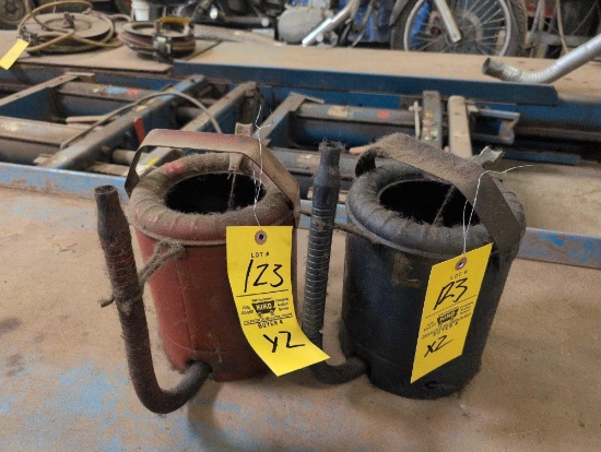 Pair of vintage swingspout cans