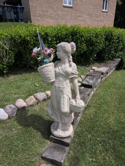 Lady holding basket cement lawn ornament