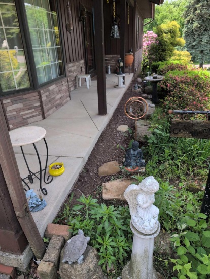 Large grouping of front porch outdoor decor and ornaments, bird bath, ducks, clay urn, Buddha and