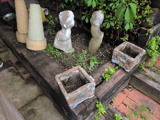 Dutch boy and girl, bases, planters and trash cans