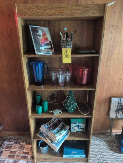 Press wood bookcase, bar stir sticks magazines, games
