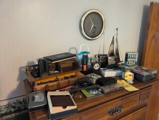 Dresser box, radios, wall art, and decor