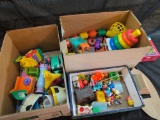 3 boxes of assorted vintage and modern toys, Fisher Price accessories, baby toys and more