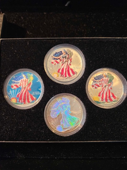 Colorized silver eagle dollars, 1999-2000, bid x 4