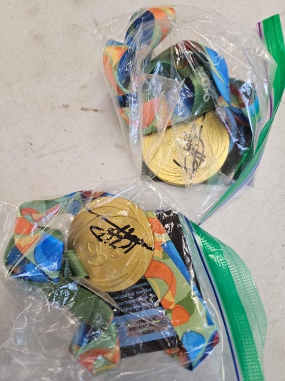 2 signed medals