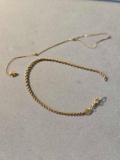 Two 14k yellow gold bracelets