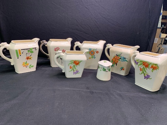 Group of vintage Harker Pottery pitchers