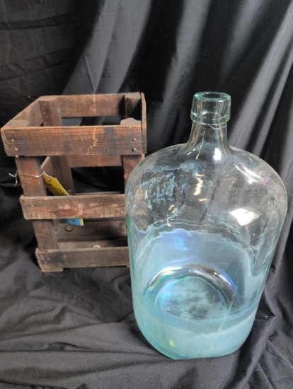 Early glass water jar with faint stenciling, original interior bumpers