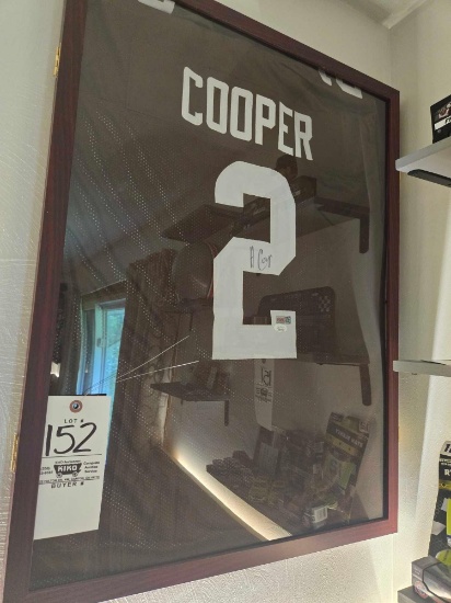 Framed "Cooper" Jersey with autograph.