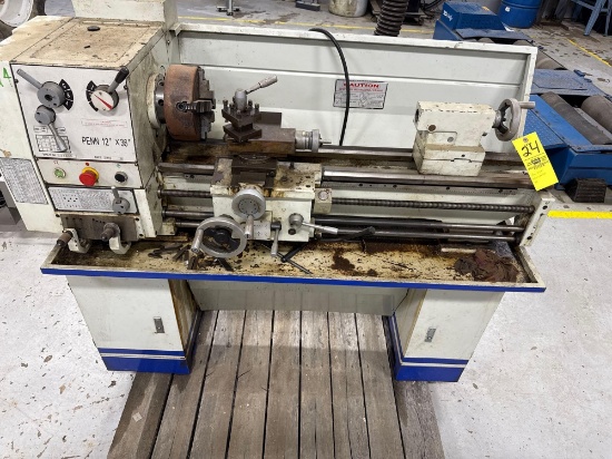 Penn 12 by 36 lathe with 4 jaw chuck