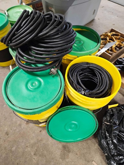 4 buckets of ext cords