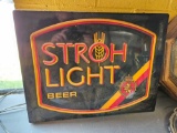 Strohs lighted sign