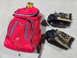 Backpack, mitts, softballs, baseballs
