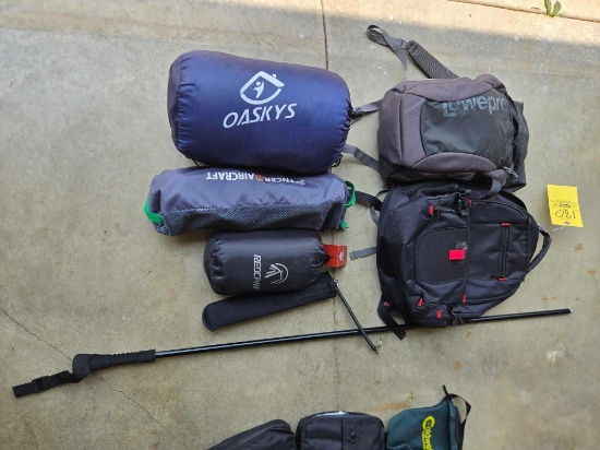 Sleeping bags, camping pillow. walking stick, backpacks