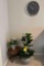 stool , clock, faux plants