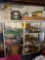2 metal storage shelves with table cloths, stereo, lots of hangers