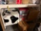 Metal shelving unit with contents - Igloo cooler, Christmas decor, wash cloths