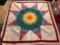 Large colorful quilt handmade by Mary Buchman