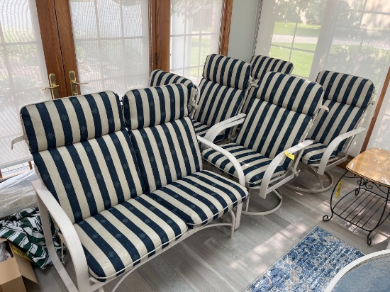 5 Patio chairs with cushions and a patio rocking bench with cushions
