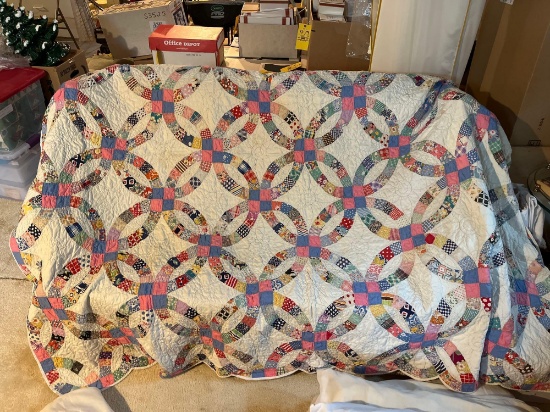 Large colorful handmade quilt by Mary Buchman