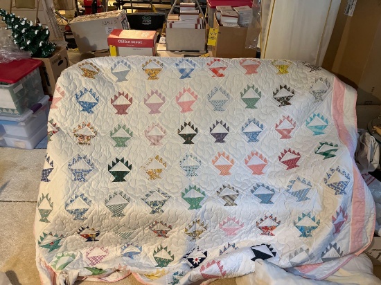 Large colorful quilt handmade by Mary Buchman