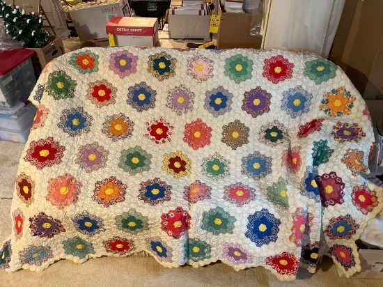 Large colorful handmade quilt by Mary Buchman