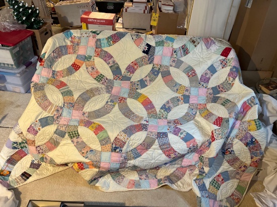 Large colorful handmade quilt by Mary Buchman