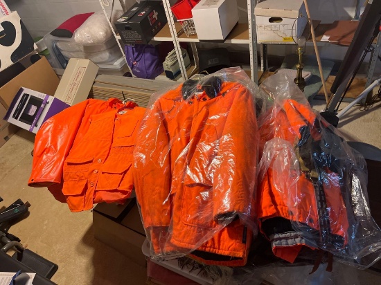 Hunting orange jackets, vests and some Carhartt coveralls