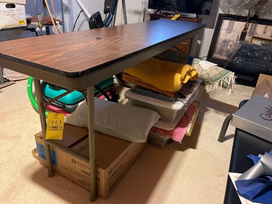 Wooden folding table, blankets, framed photos