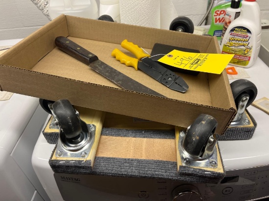 2 dolly carts, drill bits, machete, wire stripper