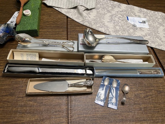 Assortment of silver plated kitchen ware - salad tongs, soup spoon, knives, spoons, cake knife