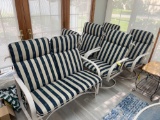 5 Patio chairs with cushions and a patio rocking bench with cushions