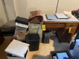 Small wooden desk with a paper shredder, sewing materials, file cabinet, and file dividers
